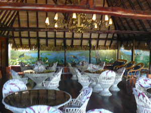 The restaurant or bistro has inddor as well as outdoor seating and a Polynesian atmosphere with its highly peaked rustic roof.